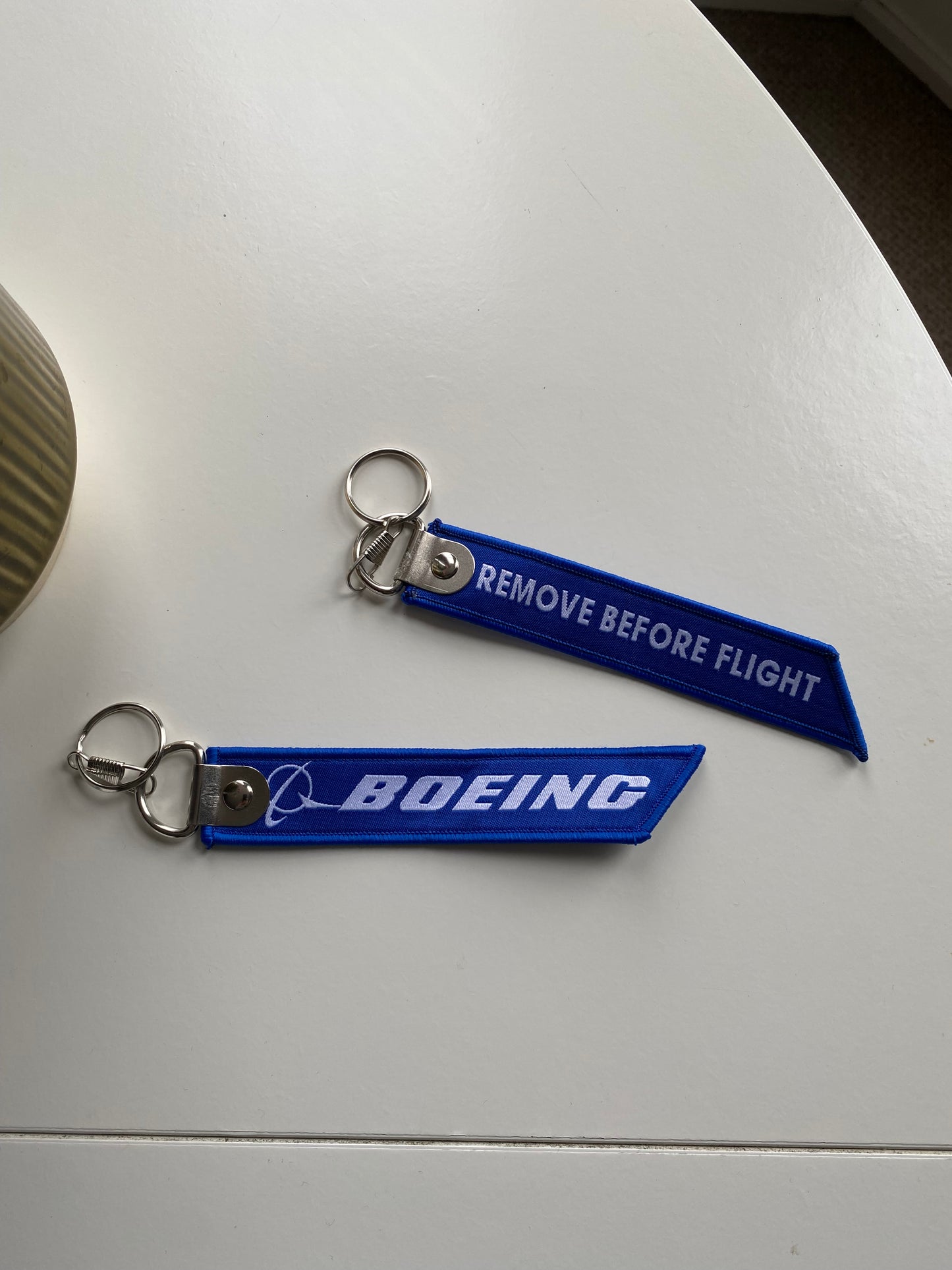 Boeing blue remove before flight luggage tag