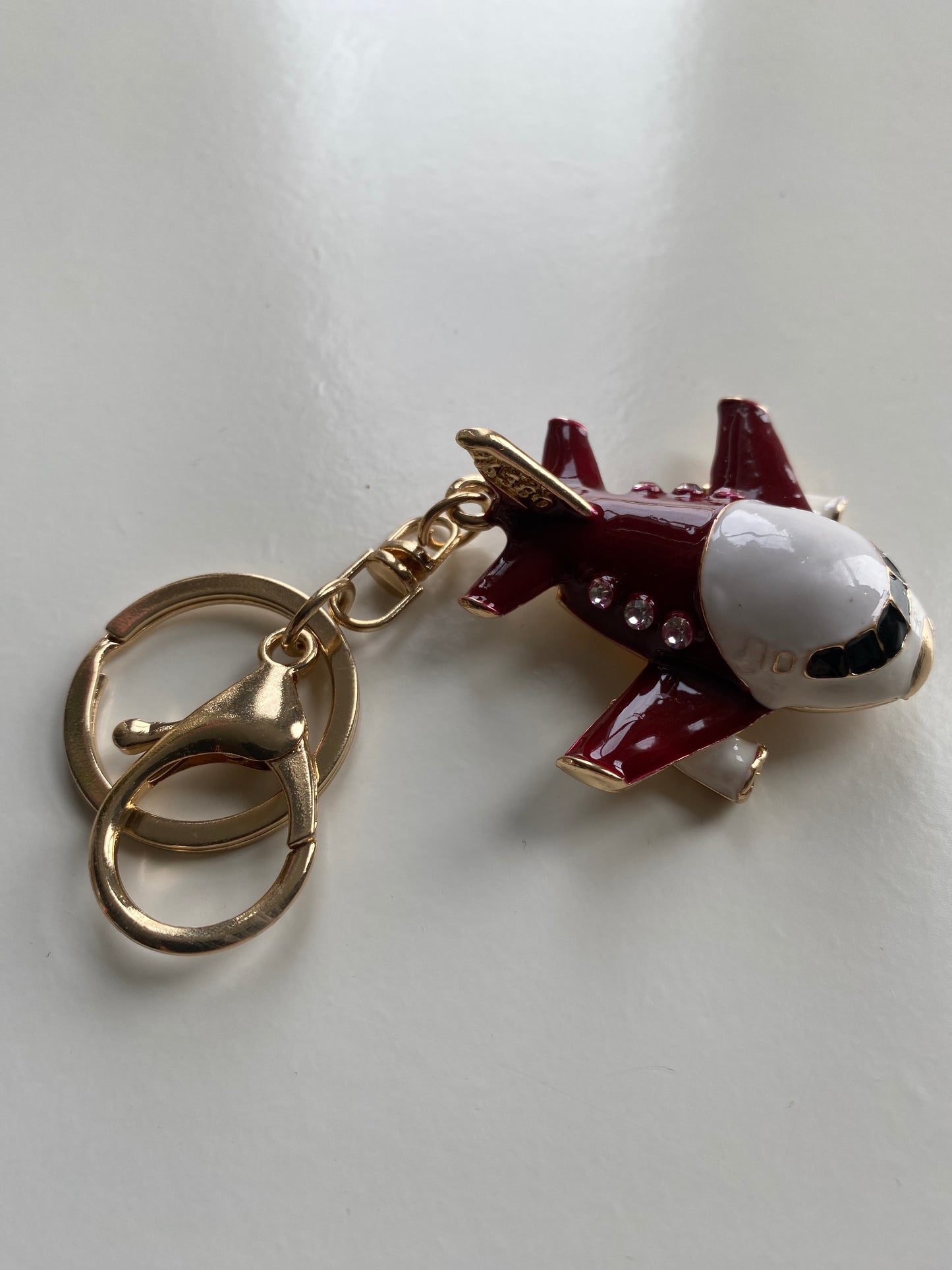 Maroon airplane Keyring