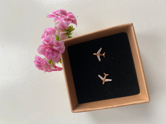 Rose gold airplane stud earrings 1